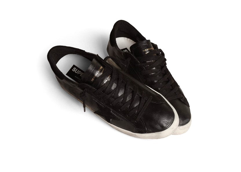 Super-Star in black nappa with black suede star and heel tab