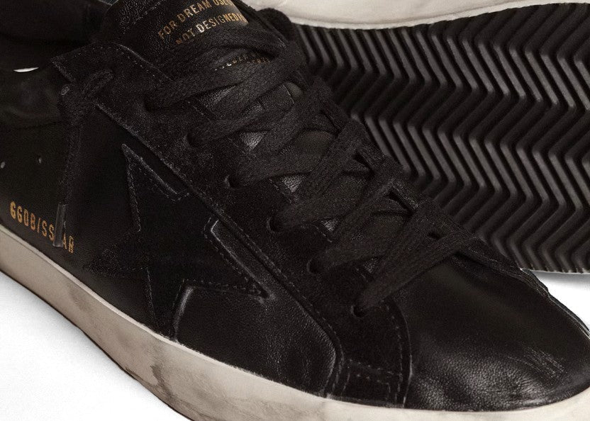 Super-Star in black nappa with black suede star and heel tab